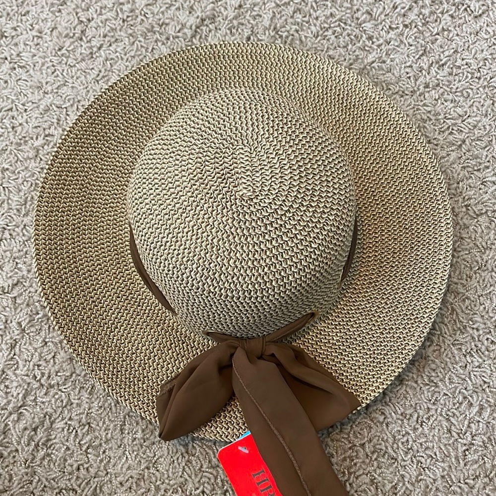 Tan flowy beach hat with brown bow